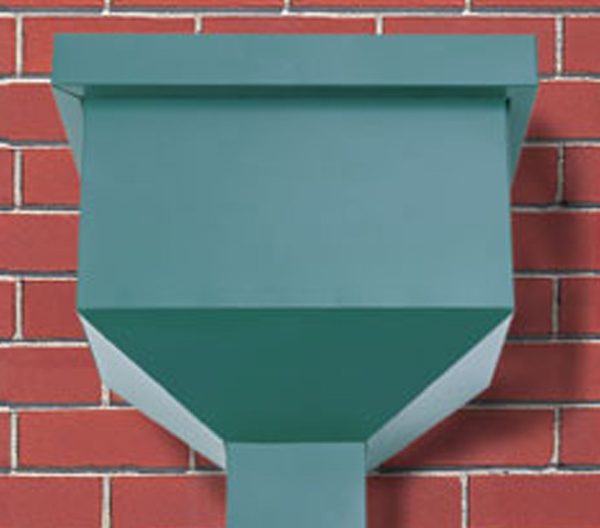 green rain heads against a brick wall